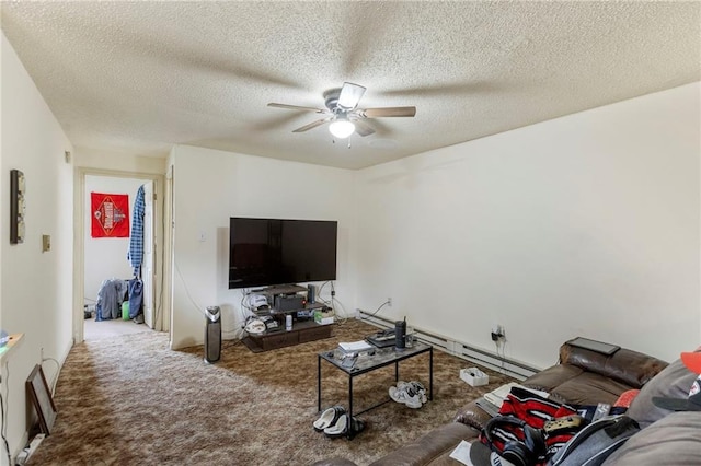301-A N 3rd St, Odessa, MO 64076 - carpeted living area featuring ceiling fan, a textured ceiling, and a baseboard heating unit