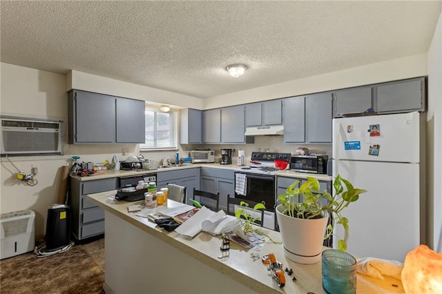 301-A N 3rd St, Odessa, MO 64076 - kitchen featuring white appliances, under cabinet range hood, gray cabinetry, light countertops, and a textured ceiling