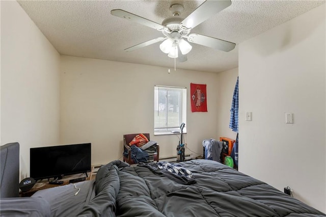 301-A N 3rd St, Odessa, MO 64076 - bedroom with a textured ceiling and ceiling fan