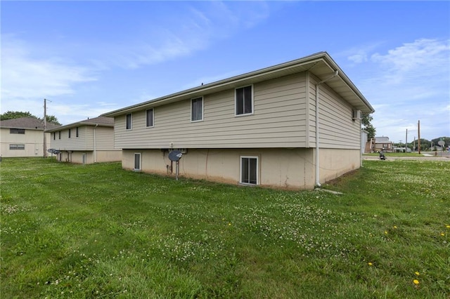 301-A N 3rd St, Odessa, MO 64076 - back of property featuring a yard