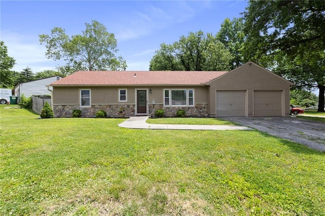 801 NE 67th Ter, Gladstone, MO 64118 - ranch-style house featuring stucco siding, stone siding, a garage, and asphalt driveway