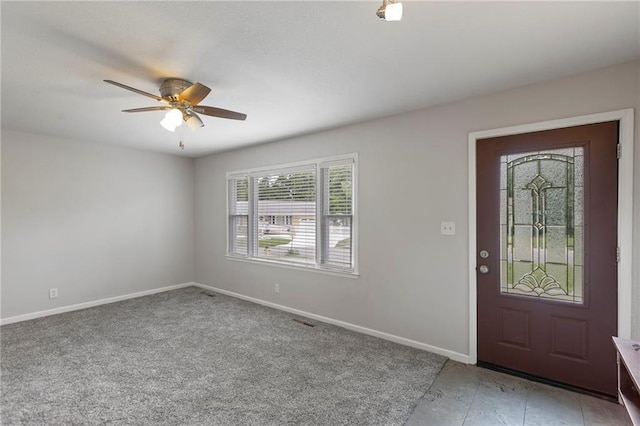 801 NE 67th Ter, Gladstone, MO 64118 - foyer featuring baseboards and ceiling fan