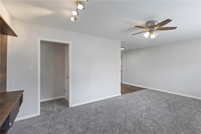 801 NE 67th Ter, Gladstone, MO 64118 - carpeted empty room featuring a ceiling fan and baseboards