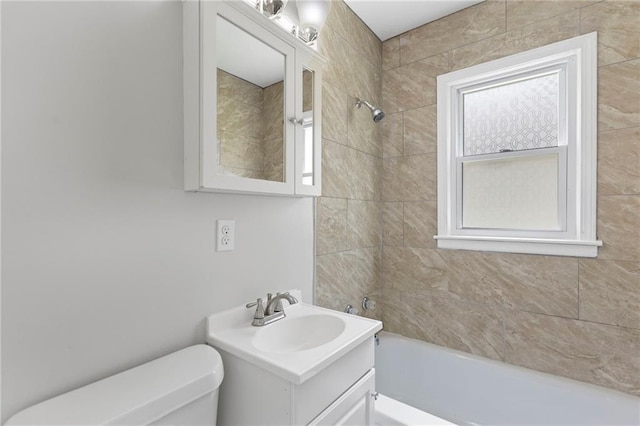801 NE 67th Ter, Gladstone, MO 64118 - bathroom featuring vanity and bathtub / shower combination