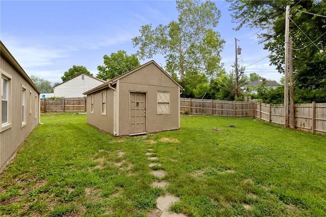 801 NE 67th Ter, Gladstone, MO 64118 - fenced backyard featuring a storage unit