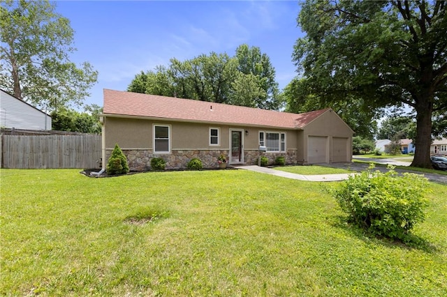 801 NE 67th Ter, Gladstone, MO 64118 - single story home with stucco siding, stone siding, an attached garage, and driveway