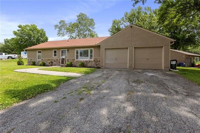 801 NE 67th Ter, Gladstone, MO 64118 - ranch-style house with stucco siding, an attached garage, a front lawn, driveway, and stone siding