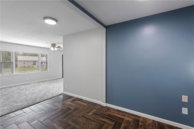 801 NE 67th Ter, Gladstone, MO 64118 - empty room featuring baseboards and a ceiling fan