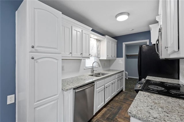 801 NE 67th Ter, Gladstone, MO 64118 - kitchen featuring stainless steel appliances, decorative backsplash, white cabinets, and light stone counters