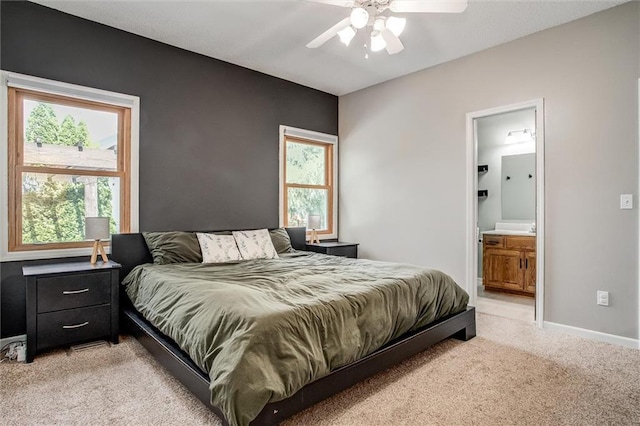 18300 Oak St, Gardner, KS 66030 - bedroom featuring light colored carpet, connected bathroom, and ceiling fan