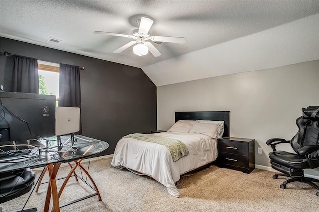 18300 Oak St, Gardner, KS 66030 - bedroom with light colored carpet, ceiling fan, a textured ceiling, and vaulted ceiling