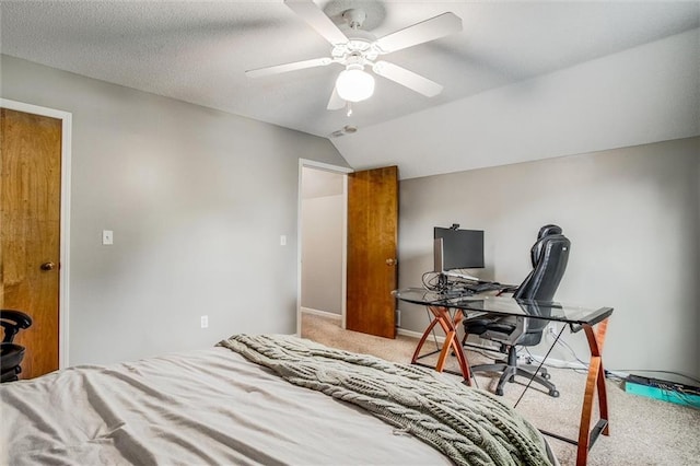 18300 Oak St, Gardner, KS 66030 - carpeted bedroom with vaulted ceiling, ceiling fan, and a desk