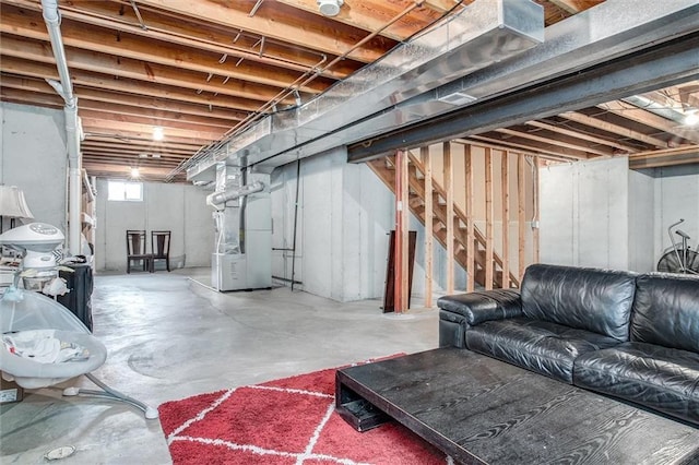 18300 Oak St, Gardner, KS 66030 - below grade area featuring heating unit and stairs