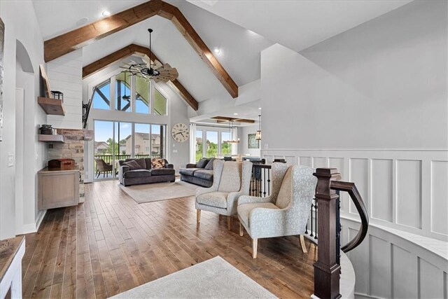 1013 Old Hickory Rd, Greenwood, MO 64034 - living room with ceiling fan, beam ceiling, high vaulted ceiling, and hardwood / wood-style flooring