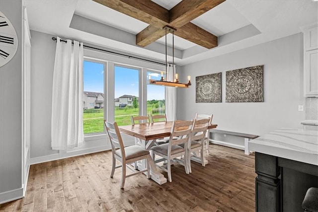 1013 Old Hickory Rd, Greenwood, MO 64034 - dining area with coffered ceiling, wood finished floors, beamed ceiling, and a wall unit AC