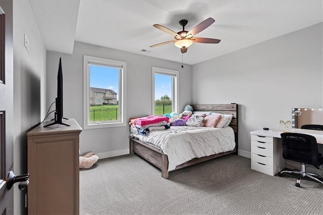 1013 Old Hickory Rd, Greenwood, MO 64034 - bedroom with light colored carpet and ceiling fan