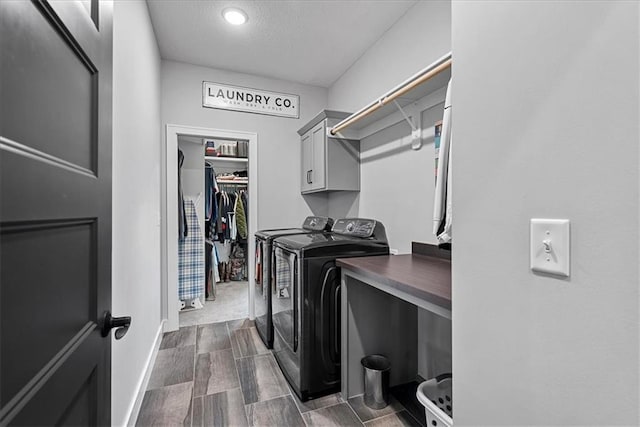 1013 Old Hickory Rd, Greenwood, MO 64034 - washroom featuring cabinet space, washer and dryer, a textured ceiling, wood tiled floors, and recessed lighting
