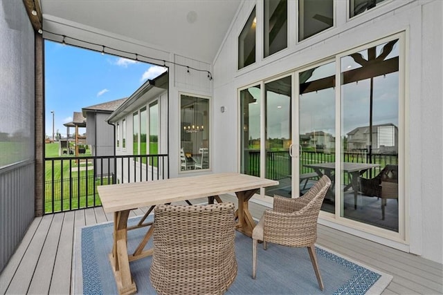 1013 Old Hickory Rd, Greenwood, MO 64034 - sunroom / solarium with lofted ceiling and outdoor dining area