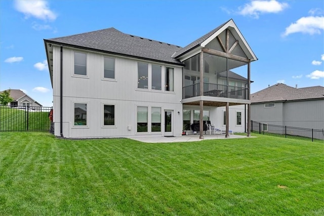 1013 Old Hickory Rd, Greenwood, MO 64034 - back of house featuring a shingled roof, a patio, a fenced backyard, and a sunroom