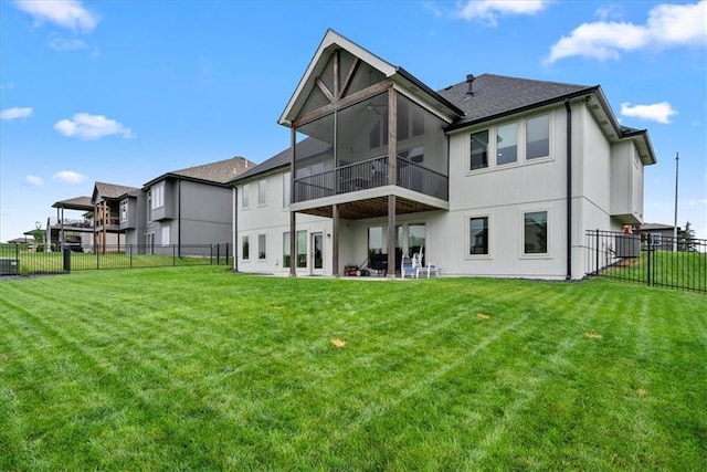 1013 Old Hickory Rd, Greenwood, MO 64034 - back of property featuring a fenced backyard, a patio, and a sunroom