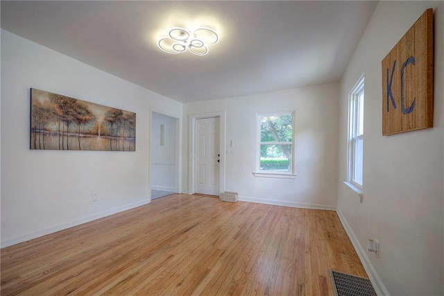 29 S 26th St, Kansas City, KS 66102 - unfurnished room with light wood-style flooring and baseboards