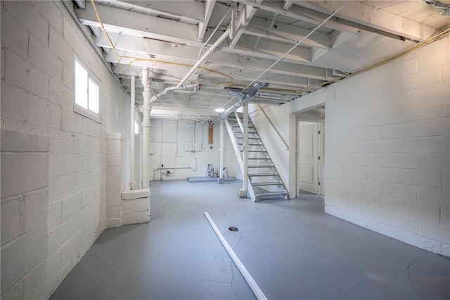 29 S 26th St, Kansas City, KS 66102 - basement featuring concrete block wall and stairs