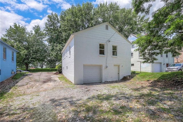 29 S 26th St, Kansas City, KS 66102 - back of house featuring a garage