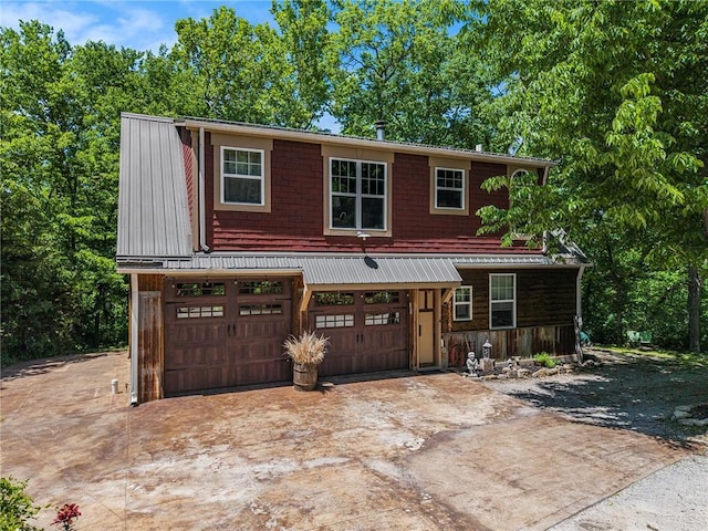 15335 Hh Hwy, Platte City, MO 64079 - view of front of home featuring concrete driveway and a garage