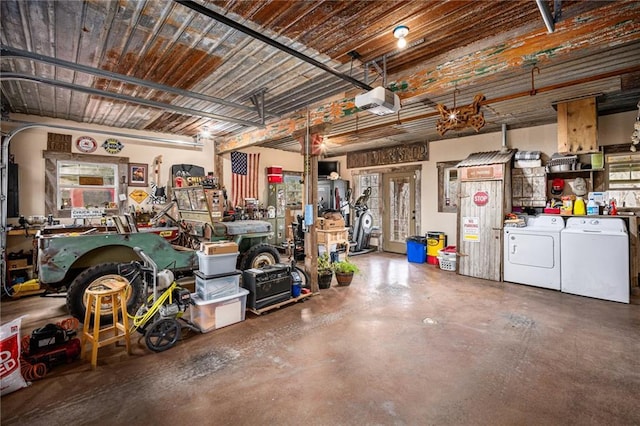 15335 Hh Hwy, Platte City, MO 64079 - garage with washing machine and clothes dryer and a garage door opener