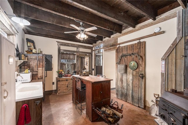 15335 Hh Hwy, Platte City, MO 64079 - office with finished concrete floors, ceiling fan, and a wooden ceiling with exposed beams