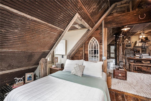 15335 Hh Hwy, Platte City, MO 64079 - bedroom with lofted ceiling and a wood stove