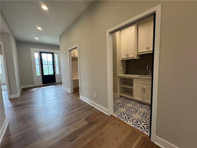 11494 S Longview Rd, Olathe, KS 66061 - unfurnished dining area with dark wood-type flooring and recessed lighting