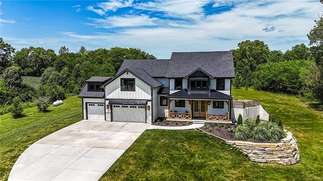 8422 NE 147th St, Liberty, MO 64068 - modern farmhouse with a front yard, driveway, french doors, board and batten siding, and a porch