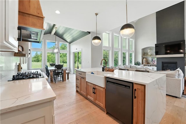 8422 NE 147th St, Liberty, MO 64068 - kitchen featuring dishwashing machine, gas cooktop, high vaulted ceiling, open floor plan, and light wood-style floors