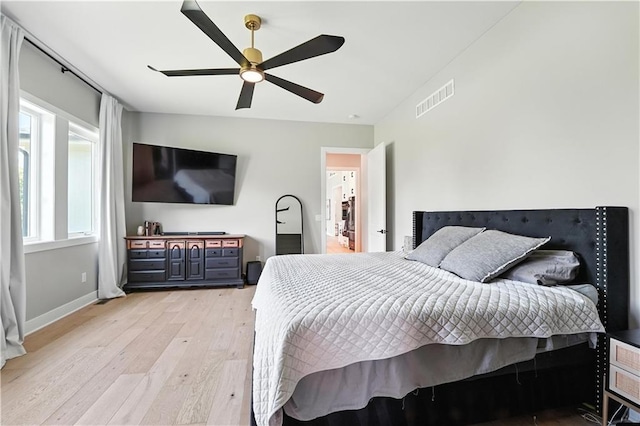 8422 NE 147th St, Liberty, MO 64068 - bedroom with light wood finished floors and a ceiling fan