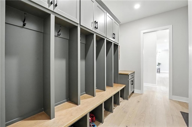 8422 NE 147th St, Liberty, MO 64068 - mudroom with light wood finished floors and recessed lighting