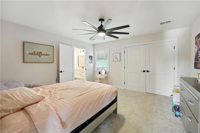 8422 NE 147th St, Liberty, MO 64068 - bedroom featuring light carpet, ceiling fan, a closet, and connected bathroom
