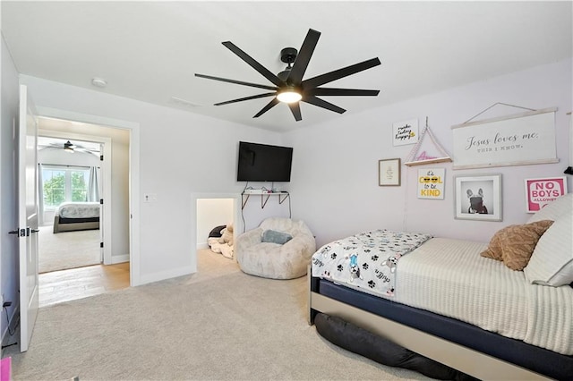 8422 NE 147th St, Liberty, MO 64068 - carpeted bedroom featuring ceiling fan and baseboards