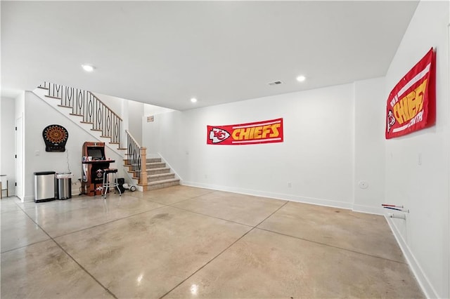 8422 NE 147th St, Liberty, MO 64068 - living room with stairway, finished concrete flooring, and recessed lighting
