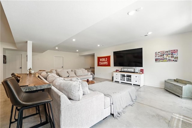 8422 NE 147th St, Liberty, MO 64068 - living room featuring recessed lighting and concrete flooring
