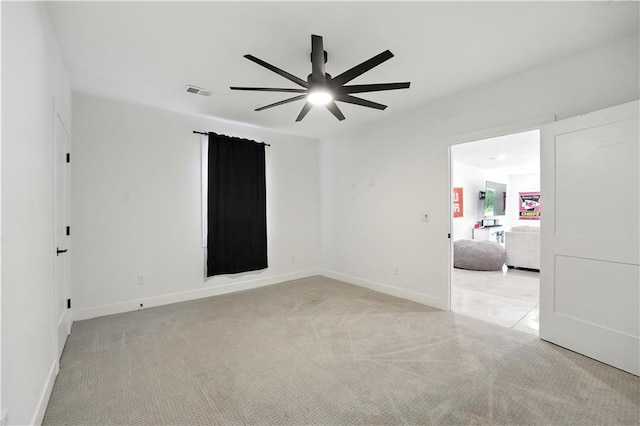 8422 NE 147th St, Liberty, MO 64068 - spare room with a ceiling fan and light carpet
