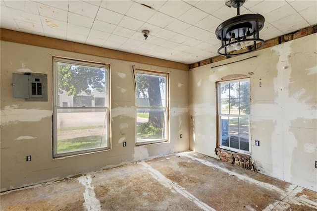 715 Walnut Ave, Osawatomie, KS 66064 - unfurnished dining area featuring healthy amount of natural light and electric panel