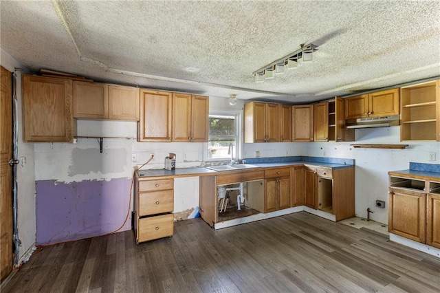 715 Walnut Ave, Osawatomie, KS 66064 - kitchen featuring under cabinet range hood, dark wood-type flooring, brown cabinetry, open shelves, and a textured ceiling