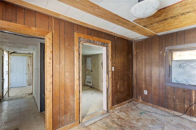 715 Walnut Ave, Osawatomie, KS 66064 - spare room with wooden walls