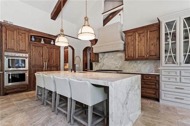 11110 W 146th Ter, Overland Park, KS 66221 - kitchen featuring stainless steel appliances, backsplash, open shelves, beam ceiling, and light stone counters