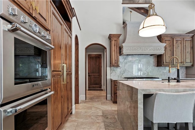 11110 W 146th Ter, Overland Park, KS 66221 - kitchen with appliances with stainless steel finishes, tasteful backsplash, light stone counters, and light stone finish floors
