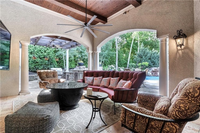11110 W 146th Ter, Overland Park, KS 66221 - view of patio with an outdoor kitchen, ceiling fan, and an outdoor living space