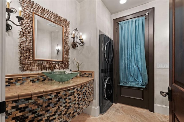 11110 W 146th Ter, Overland Park, KS 66221 - foyer entrance featuring stacked washer / dryer