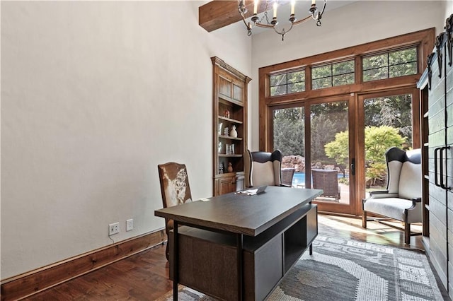 11110 W 146th Ter, Overland Park, KS 66221 - office area with dark wood-type flooring, a towering ceiling, and a chandelier