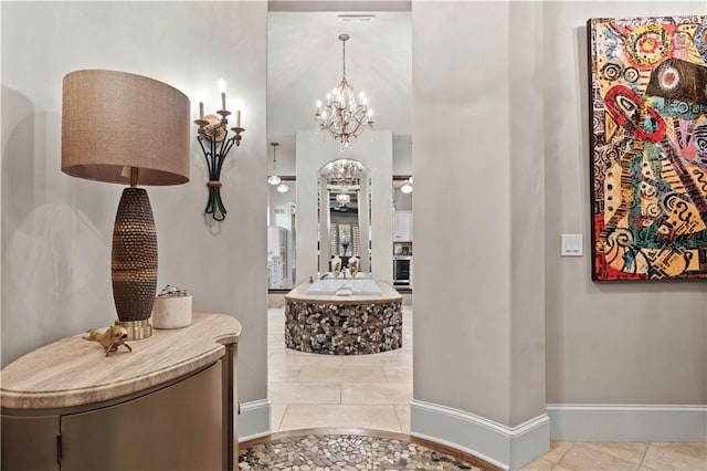 11110 W 146th Ter, Overland Park, KS 66221 - full bathroom with a chandelier, a bath, and a towering ceiling